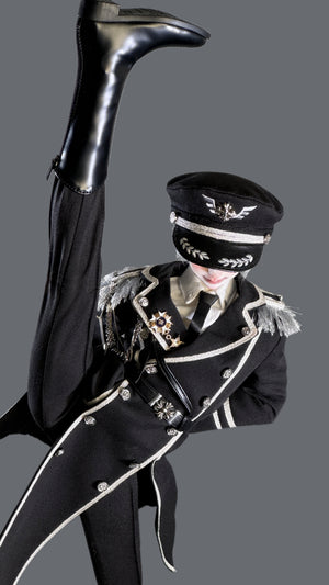 MDollSchool BJD doll in a black military uniform with silver trim and a captain's hat.