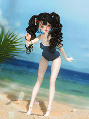 Lucia BJD Head MSD 1/4 doll with black pigtails in a blue swimsuit on a sandy beach