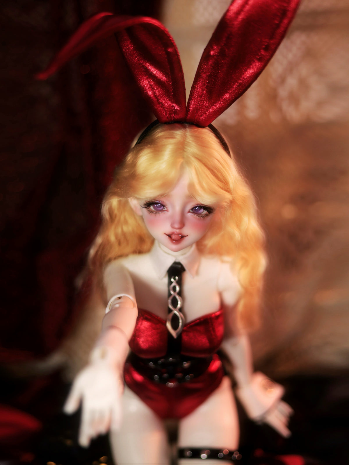 MDollSchool 1/4 BJD doll with blonde hair, red bunny ears, and a red outfit.