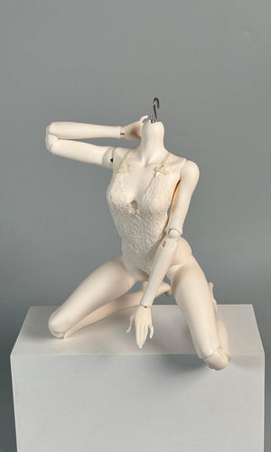 MDollSchool G02 Female Body MSD 1/4 BJD doll in white lace lingerie posing on a white block
