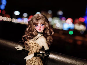 MDollSchool Lucia 1/4 MSD BJD doll in leopard print dress with wavy brown hair at night