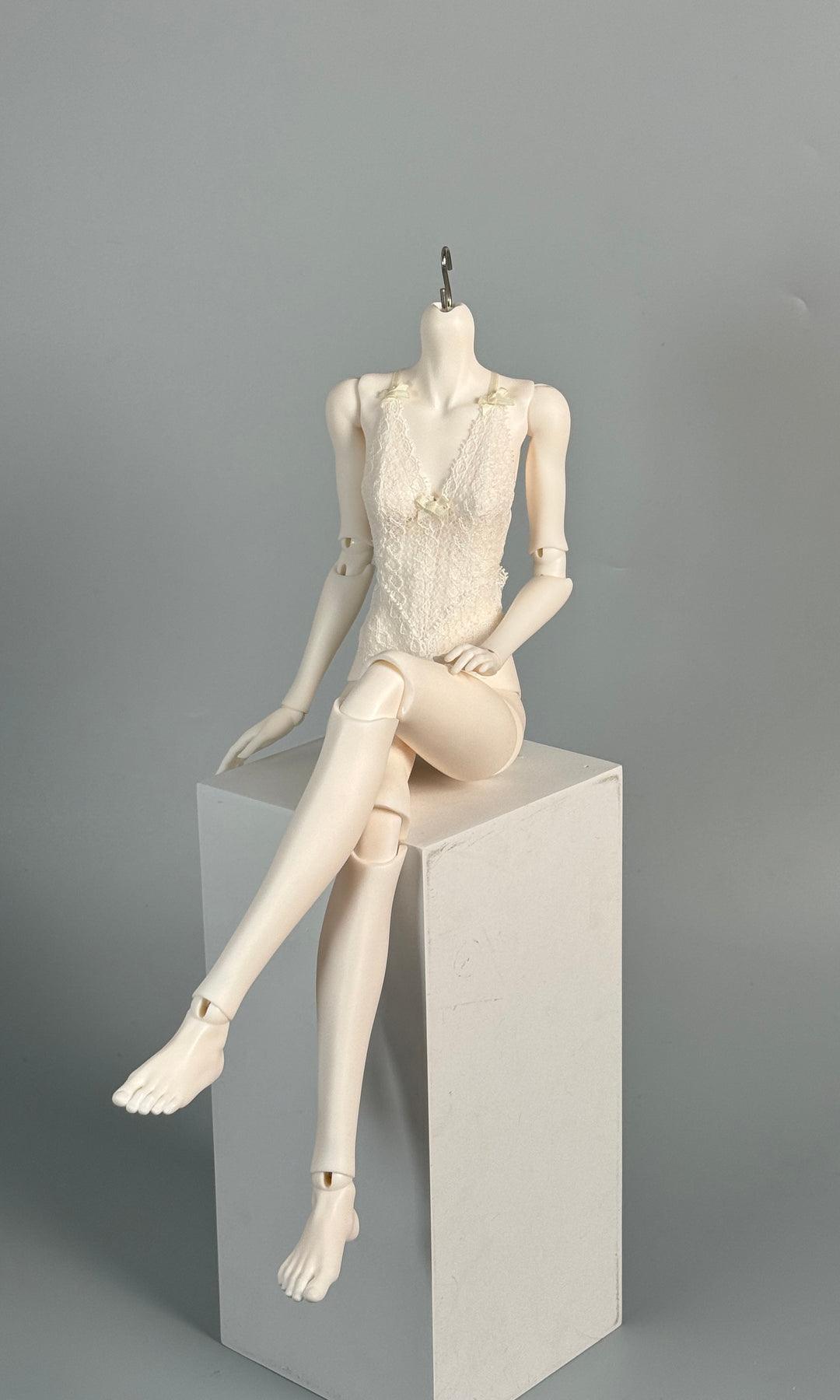 MDollSchool G02 1/4 BJD female doll body wearing a white lace top sitting on a white cube