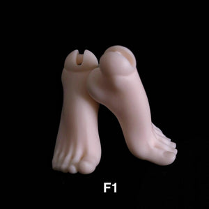 Pair of MDollSchool G02 female BJD doll feet in resin, model F1, on a black background