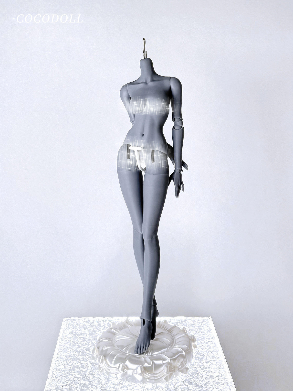 cocodollbjd White Choco 1/4 scale PVC doll body standing on a white decorative base