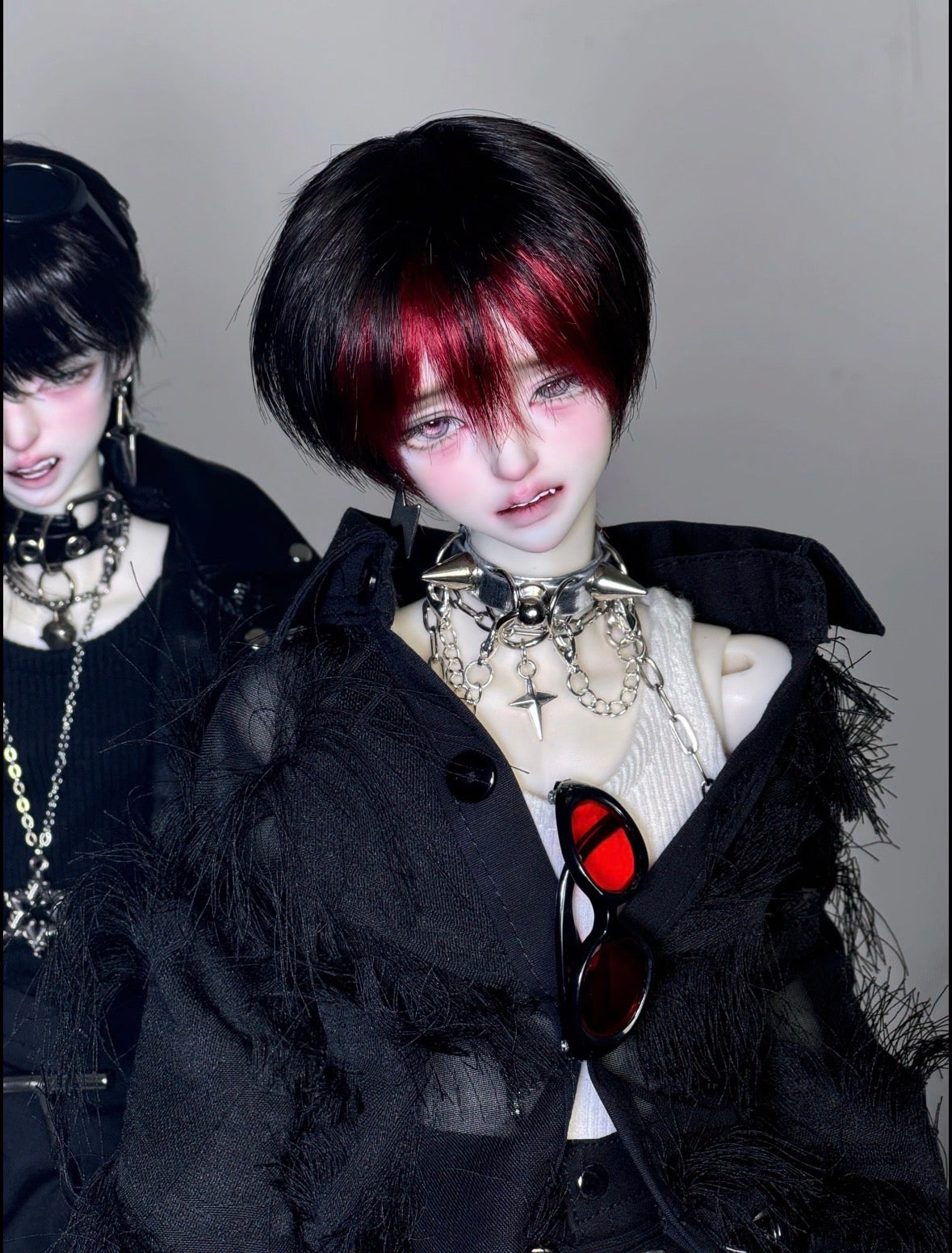 MDollSchool Bao BJD head with black and red hair, gothic jewelry, and black jacket