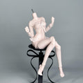 MDollSchool 1/4 BJD doll body in white lace lingerie sitting on a black sculptural stool