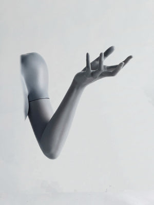 Close-up of a white MDollSchool 1/4 BJD doll arm and hand in a graceful posing gesture.