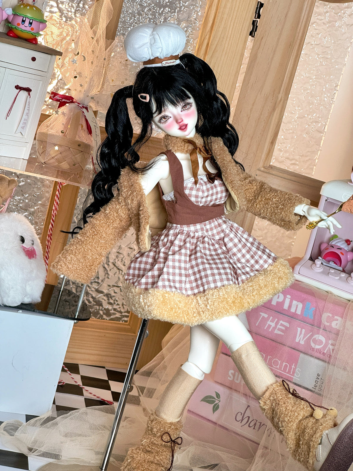 MDollSchool Lucia 1/4 MSD BJD doll in a brown checkered dress and plush brown cardigan.