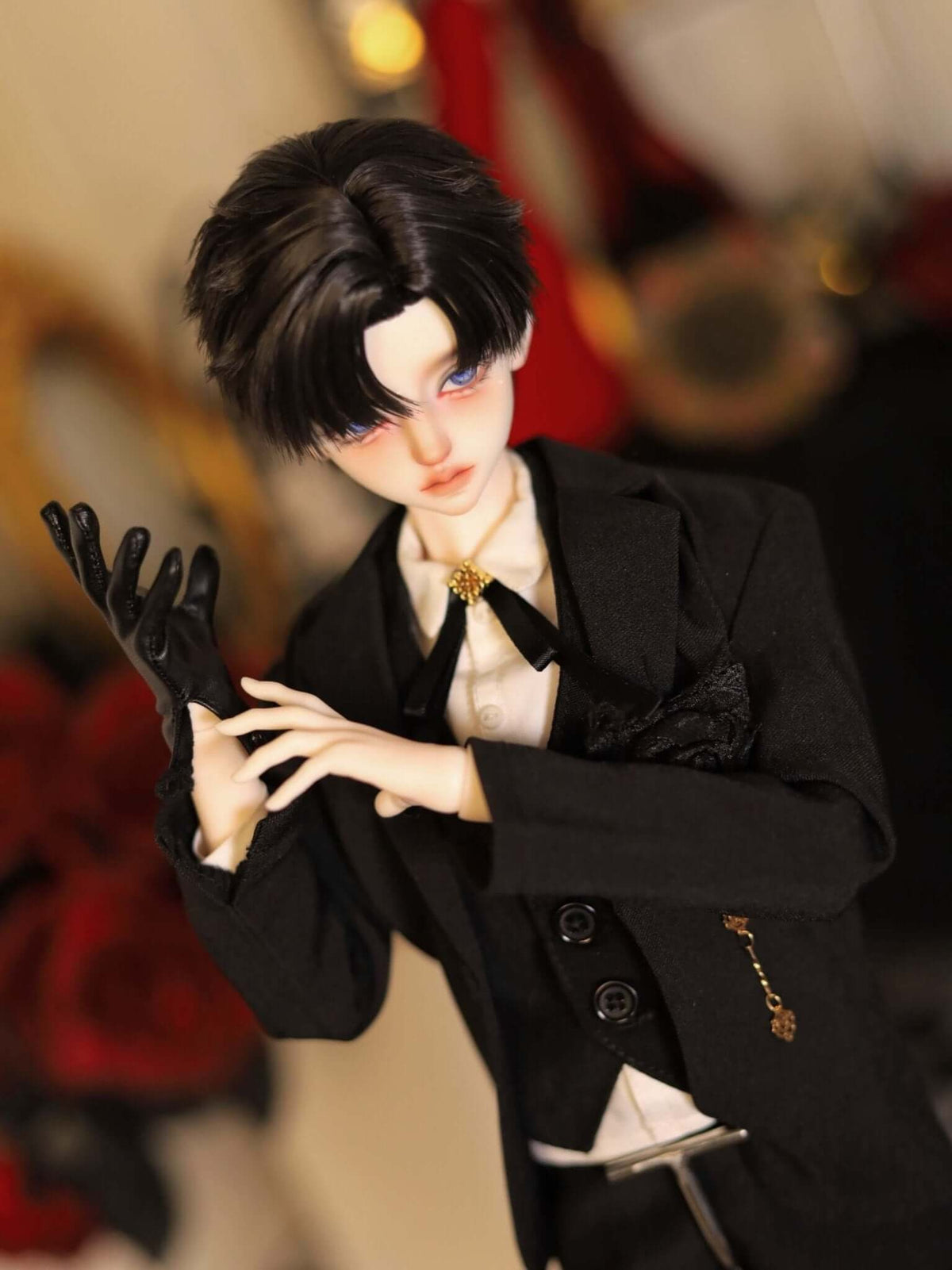 MDollSchool Alpha BJD doll with black hair, wearing a formal black suit and black glove.