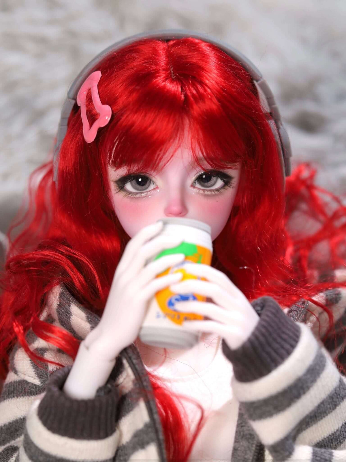 MDollSchool KiKi BJD MSD 1/4 doll head with red hair and headphones drinking from a can