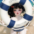 Lucia BJD Head (MSD 1/4) doll with black hair peering through a lifebuoy ring