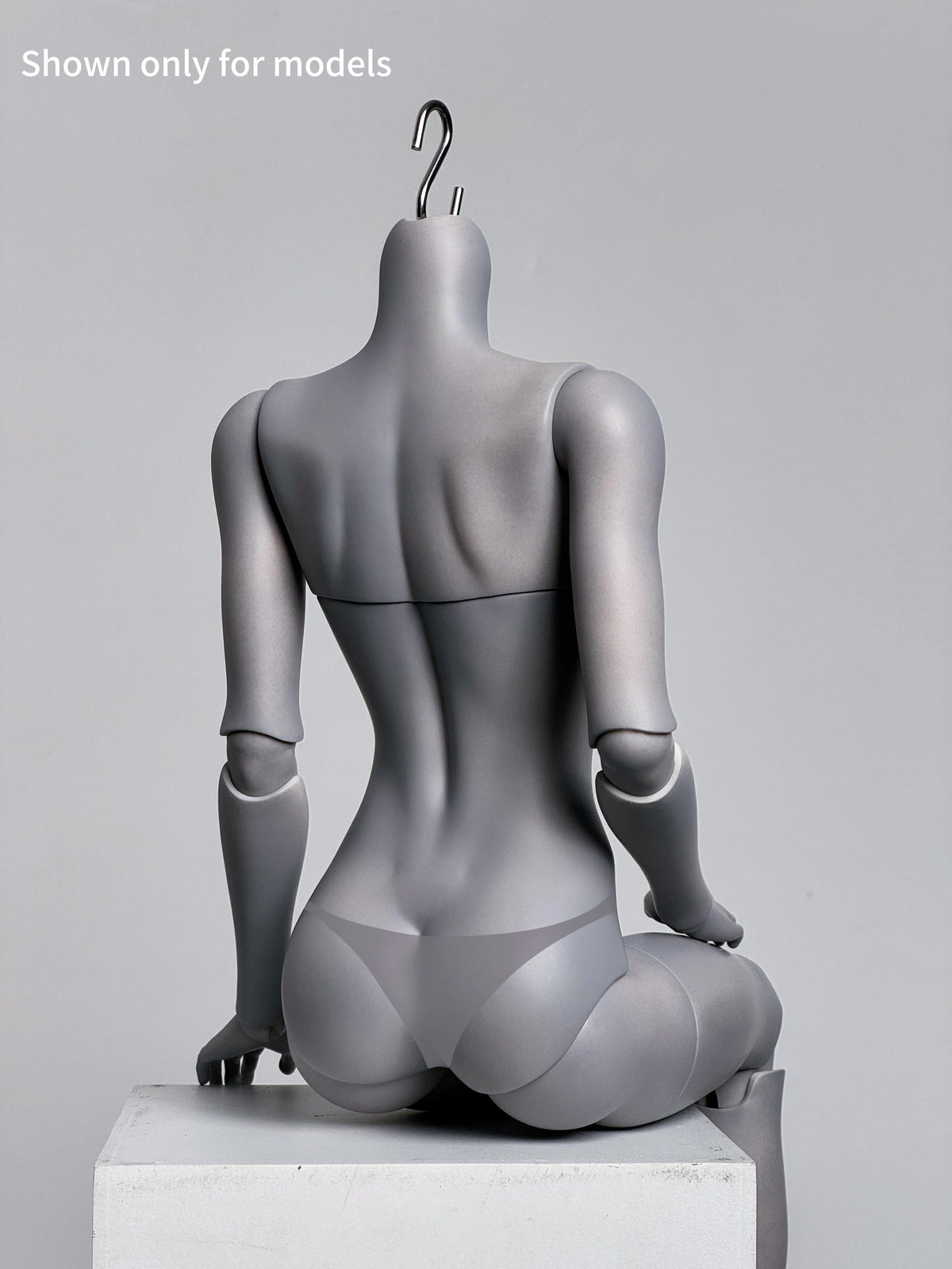 Rear view of MDollSchool G02 1/4 scale BJD female doll body in grey resin